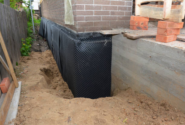 SJ Waterproofing Pros technician performing targeted Foundation Crack Repair assessment in Olney, IL